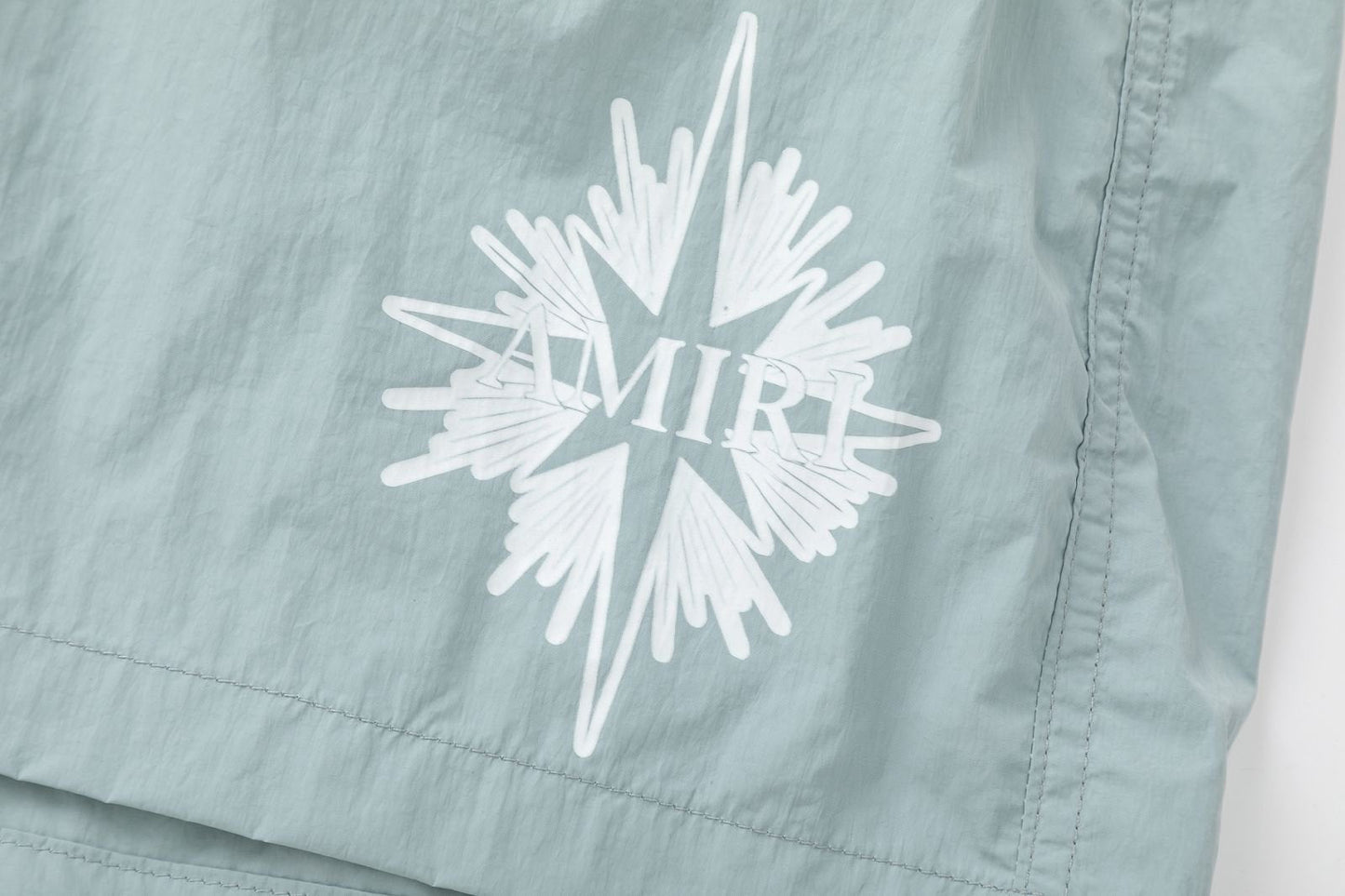 AMIRI Starburst logo shell swim shorts