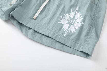 AMIRI Starburst logo shell swim shorts