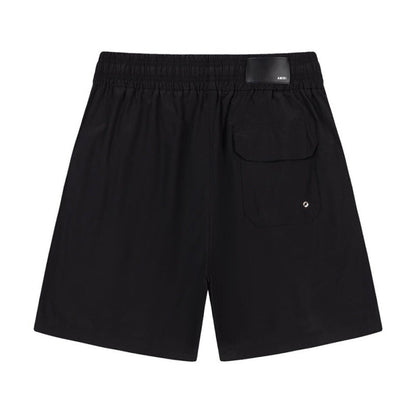 AMIRI Starburst logo shell swim shorts